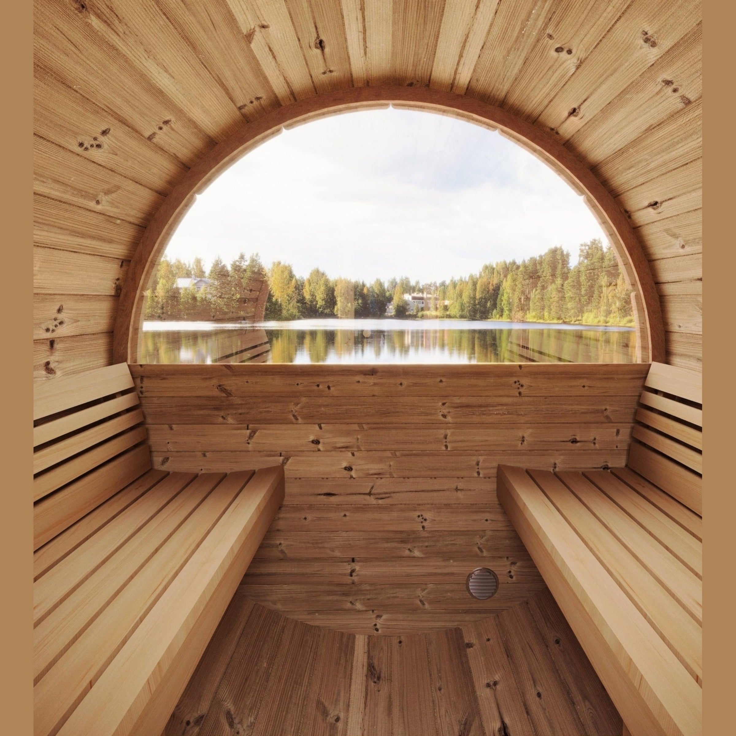 Wooden sauna with a large circular window overlooking a lake and trees